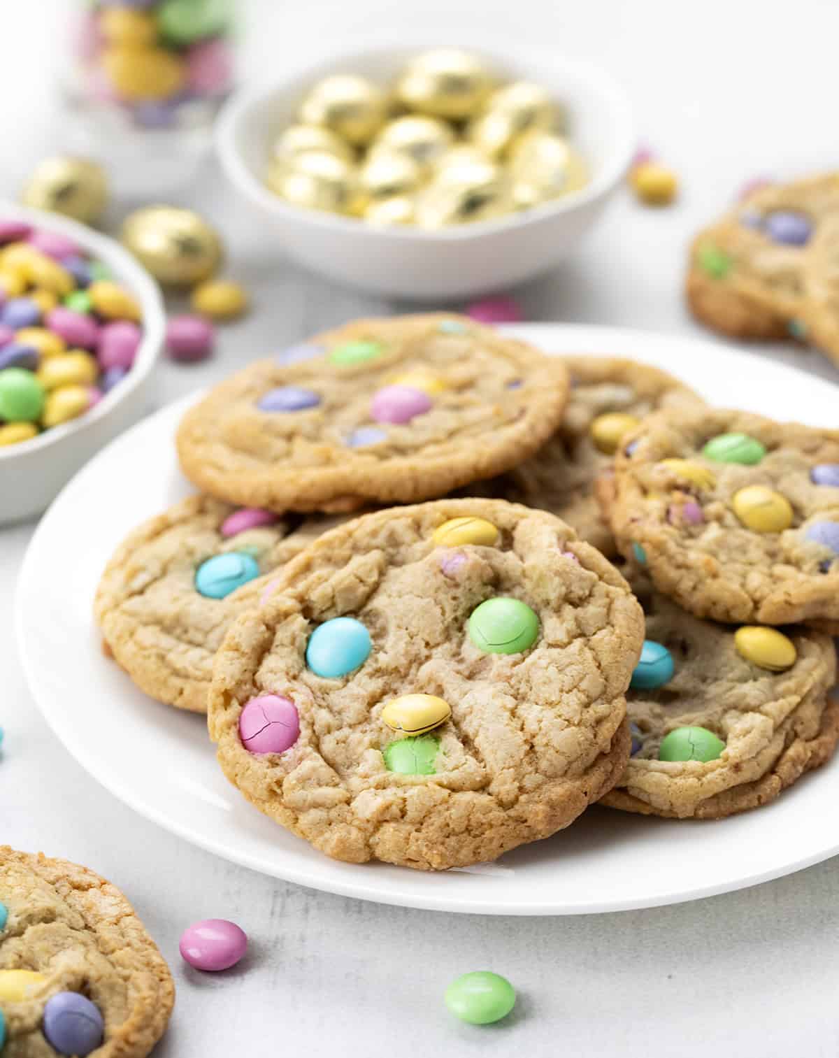 Plate of Easter M&M Cookies surrounded by easter candy.