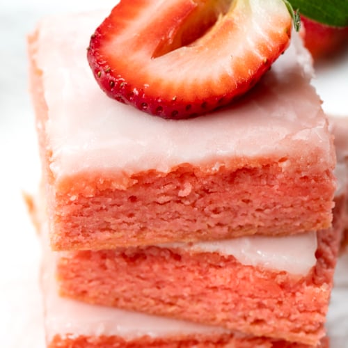 Close up of the top of a stack of Strawberry Brownies.