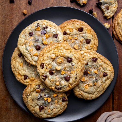 Butterscotch Chocolate Chip Cookies on a black plate from overhead.
