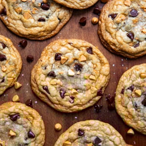 Butterscotch Chocolate Chip Cookies on a wooden table shot from overhead.