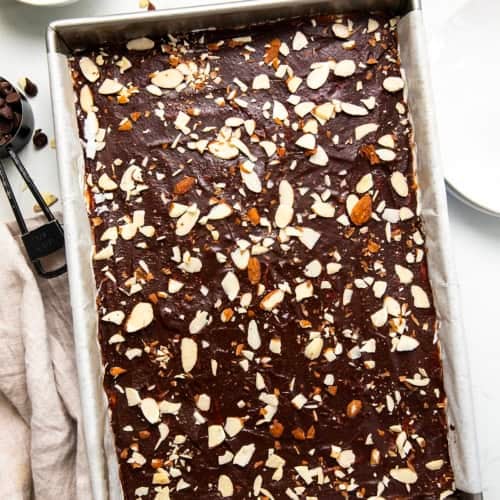 Pan of Sherry Almond Brownies on a white table from overhead.