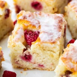 Close up of a glazed Raspberry Butter Swim Biscuit.