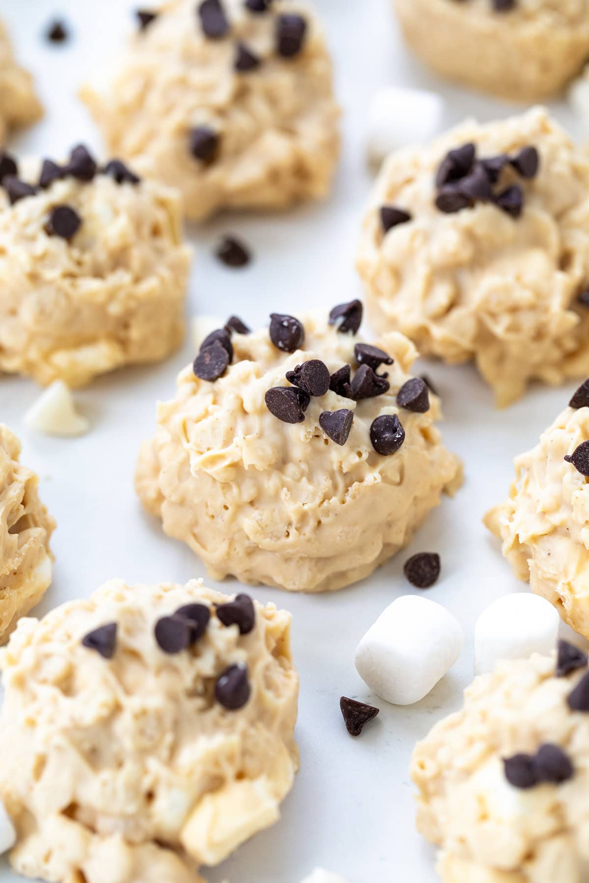 Close up of Avalanche Cookies on a white table.