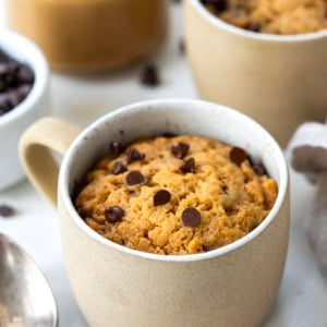 Peanut Butter Mug Cakes on a white table close up.