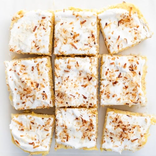 Coconut Cream Pie Bars cut into squares from overhead.