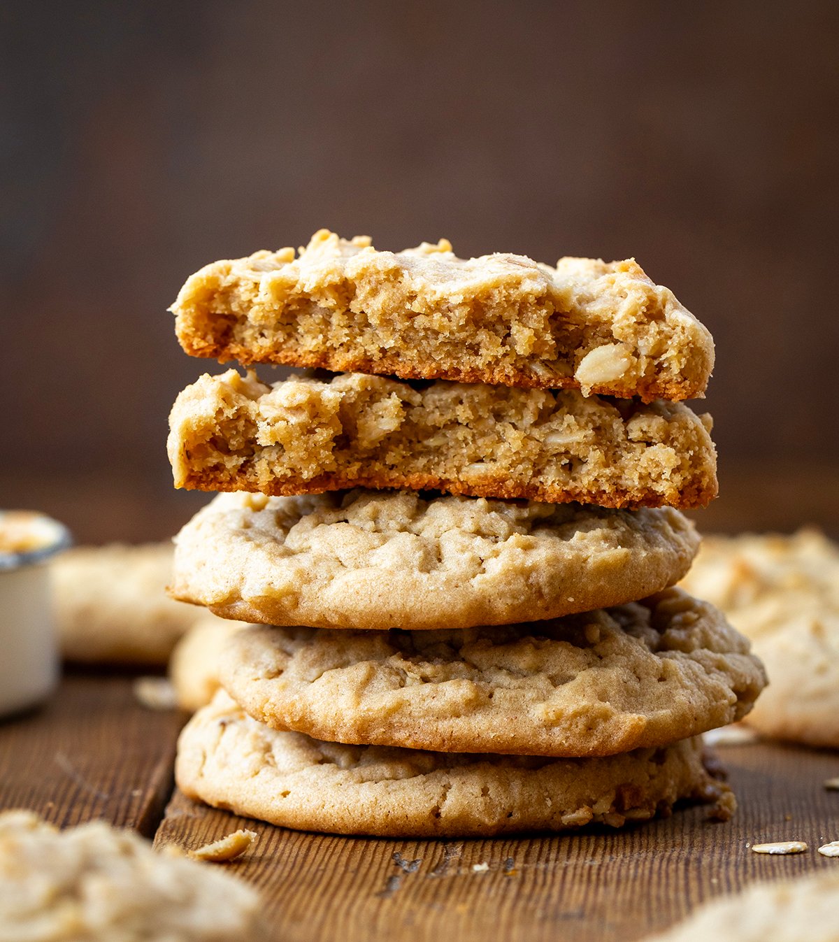 Stack of Peanut Butter Oatmeal Cookies on a wooden table.