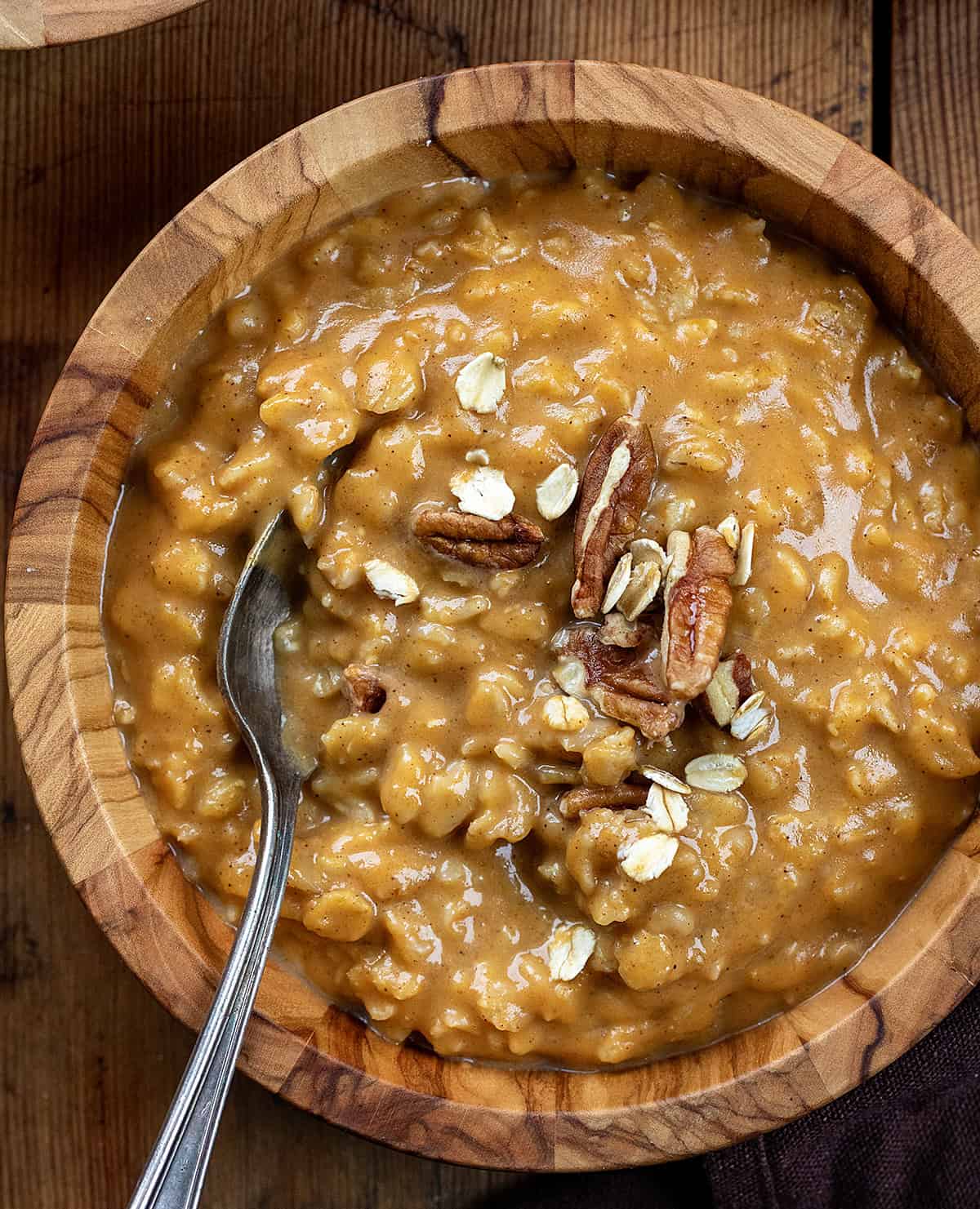 Pumpkin Spice Oatmeal close up with a spoon in it from overhead.