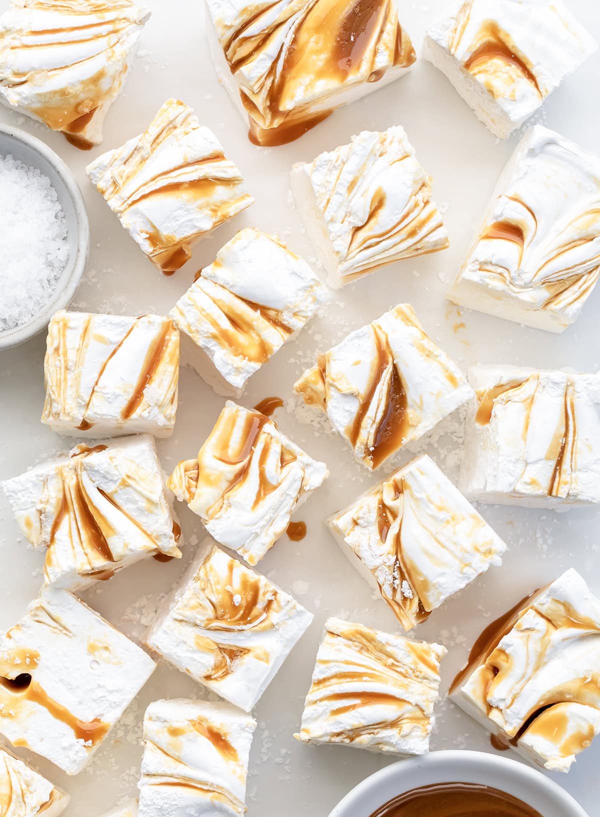 Salted Caramel Swirl Marshmallows cut into squares and separated from overhead.