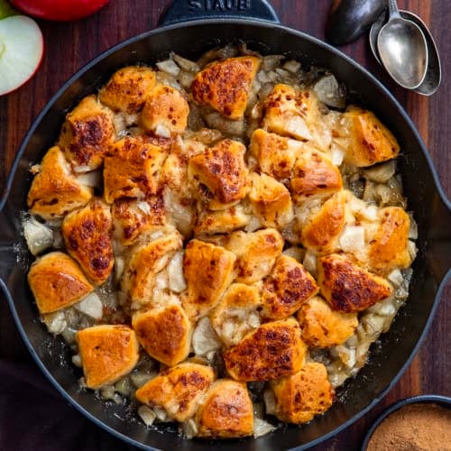 Apple Cinnamon Roll Bake on a wooden table from overhead.