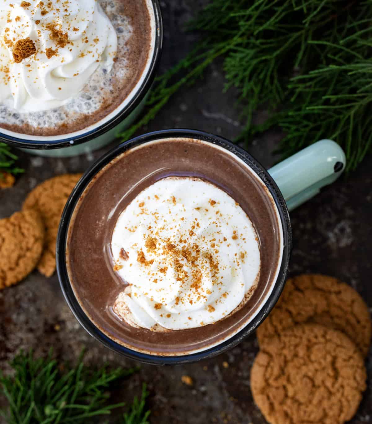 Looking down on a table with Gingerbread Hot Chocolate's on it.