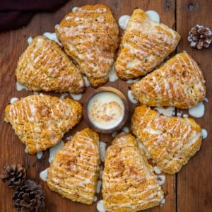 Eggnog Scones on a wooden table from overhead.