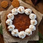 Gingerbread Cheesecake on a wooden table from overhead.