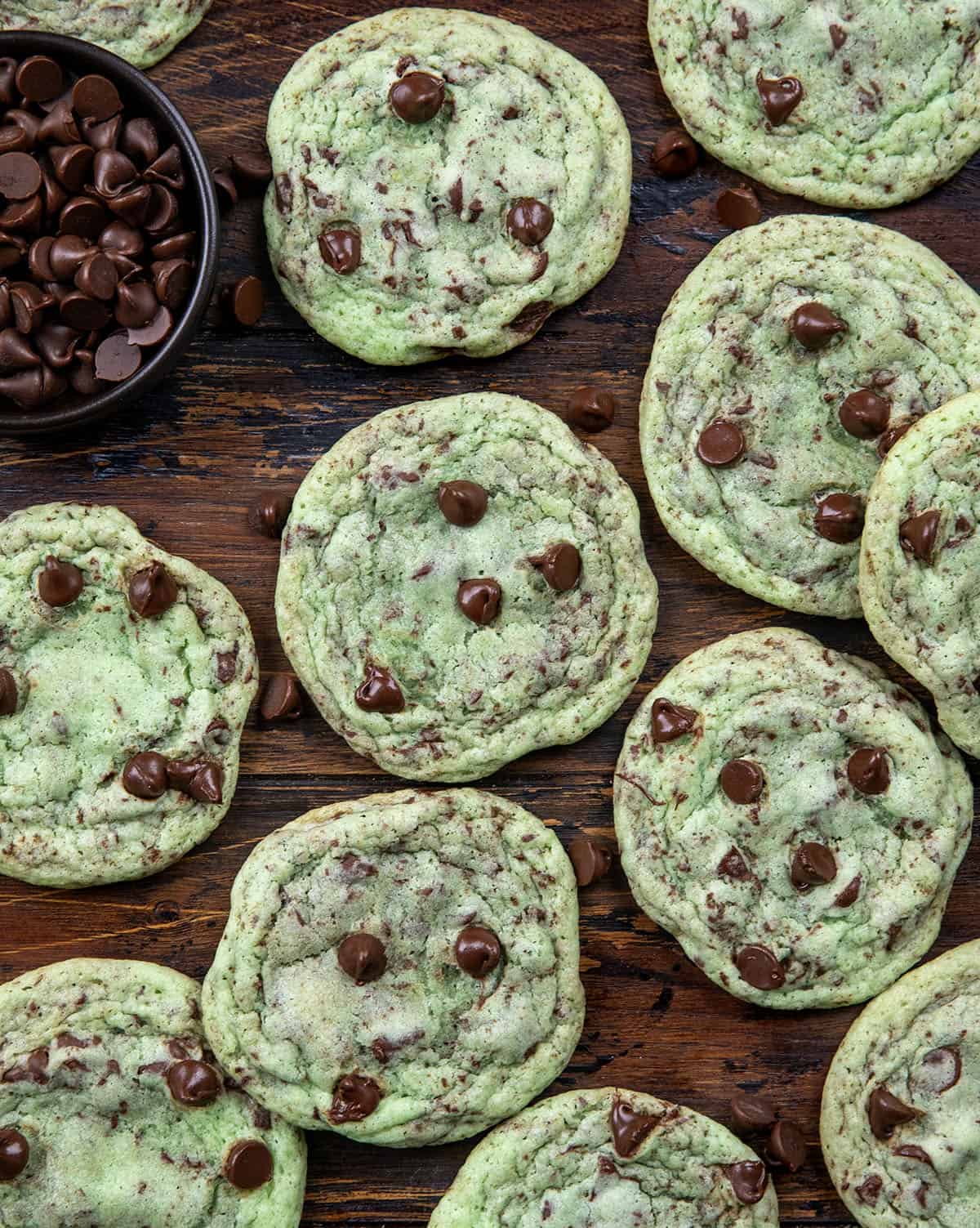 Mint Chocolate Chip Cookies on a wooden table from overhead.