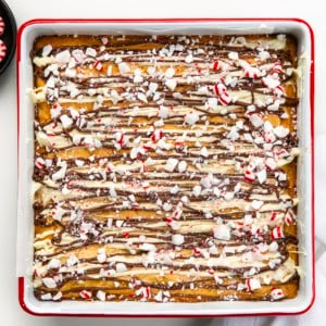 Pan of Peppermint Bark Blondies on a white table from overhead.