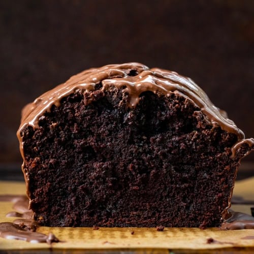 Loaf of Peppermint Brownie Bread cut in half showing inside texture.