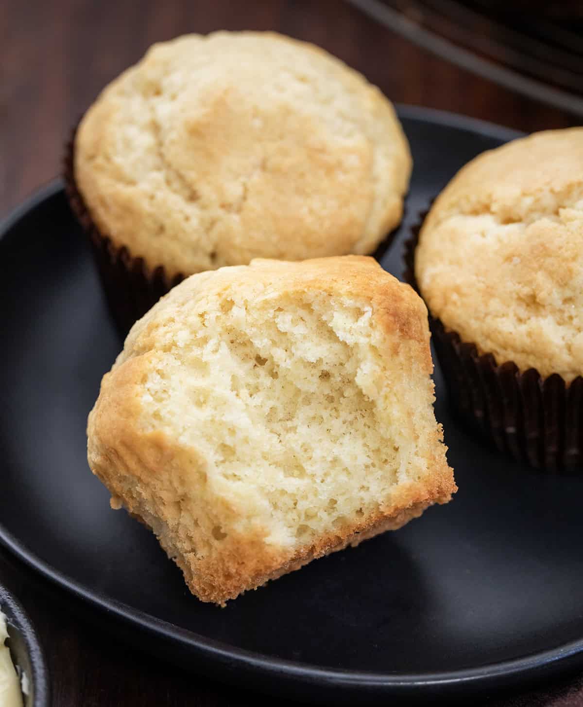 Close up of a halved Buttermilk Muffins showing the tender inside.