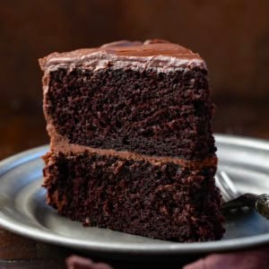 Slice of Devil's Food Cake on a plate with a fork.