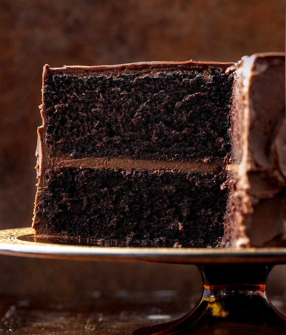 Close up of a cut into Devil's Food Cake showing inside texture.