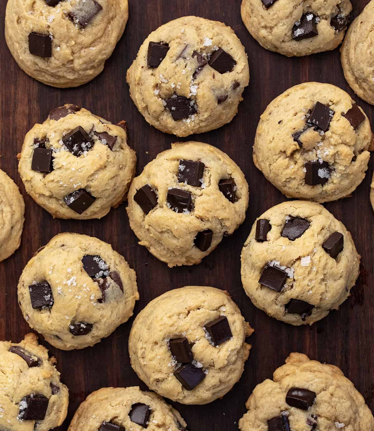 Salted Honey Chocolate Chip Cookies laid out on a table from overhead.