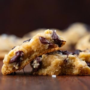 Halved Salted Honey Chocolate Chip Cookies on a table very close up.