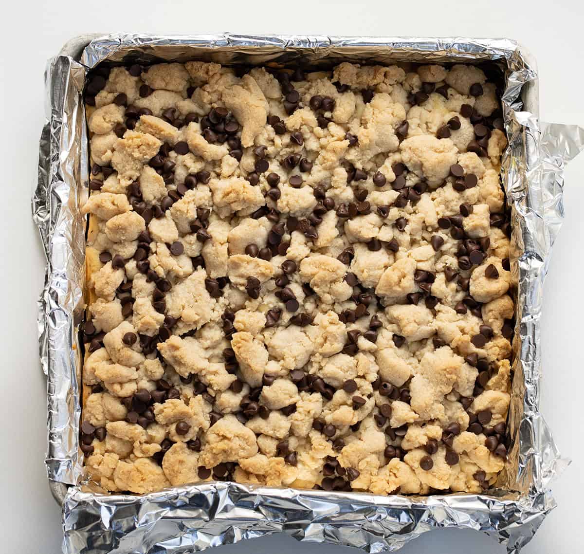 Pan of Chocolate Chip Crumb Cake in foil.