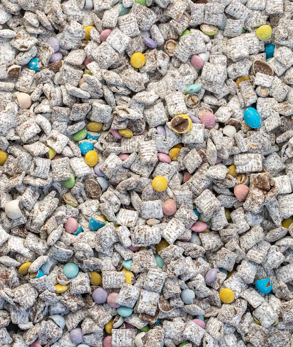 Close up of a pan covered in Easter Puppy Chow.