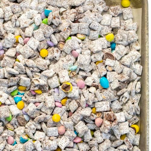 Sheet pan covered with Easter Puppy Chow.