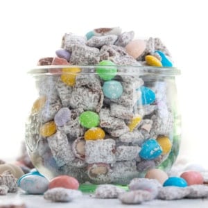 Glass jar filled with Easter Puppy Chow.
