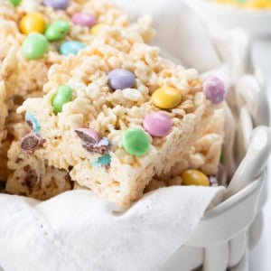 Close up of Easter Rice Krispie Treat in a white glass basket.