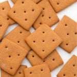 Homemade Graham Crackers laid out on a white table.