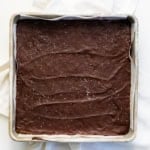 Pan of No-Bake Peanut Butter Oat Bars on a white table.