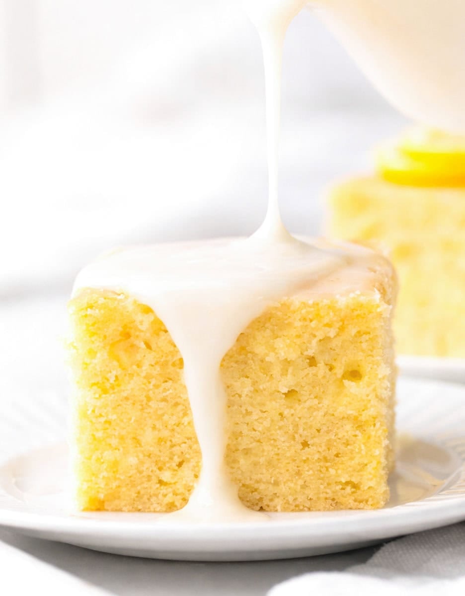 Drizzling glaze over Lemon Sheet Cake.