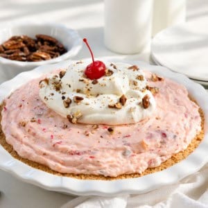 Millionaire Pie in a white pie plate on a white table.