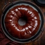 Triple Chocolate Pound Cake covered in glossy chocolate ganache from overhead.