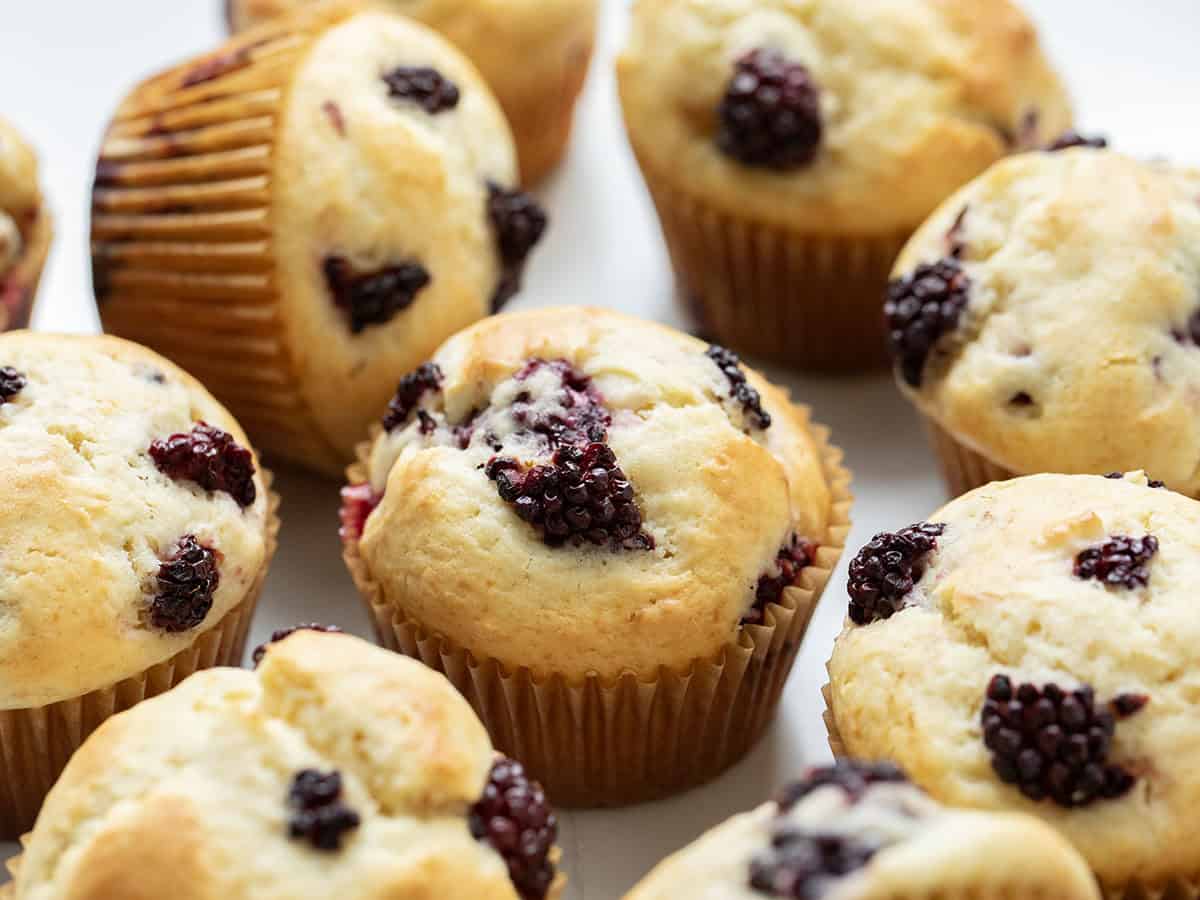 Close up of Blackberry Muffins on a white table.