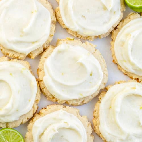 Key Lime Cookies laid out on a white table from overhead.