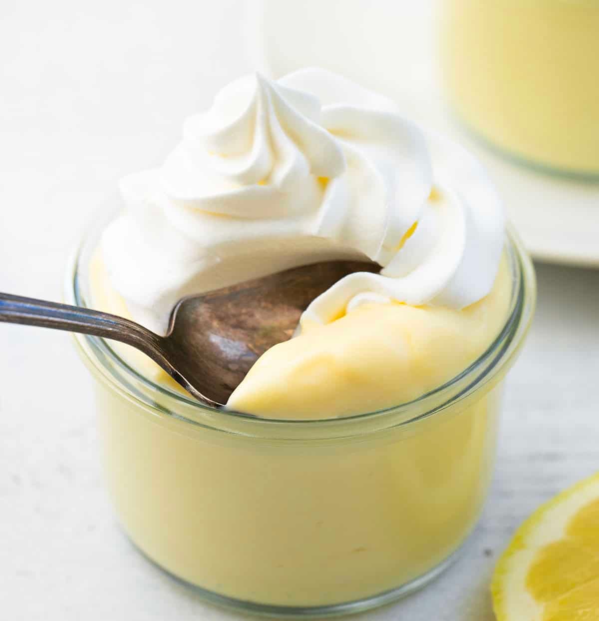 This homemade lemon pudding is smooth, creamy, and full of bright citrus flavor. Made from scratch on the stovetop, it has a rich, silky texture and just the right balance of sweet and tangy. Spoonful of Lemon Pudding right from the jar.