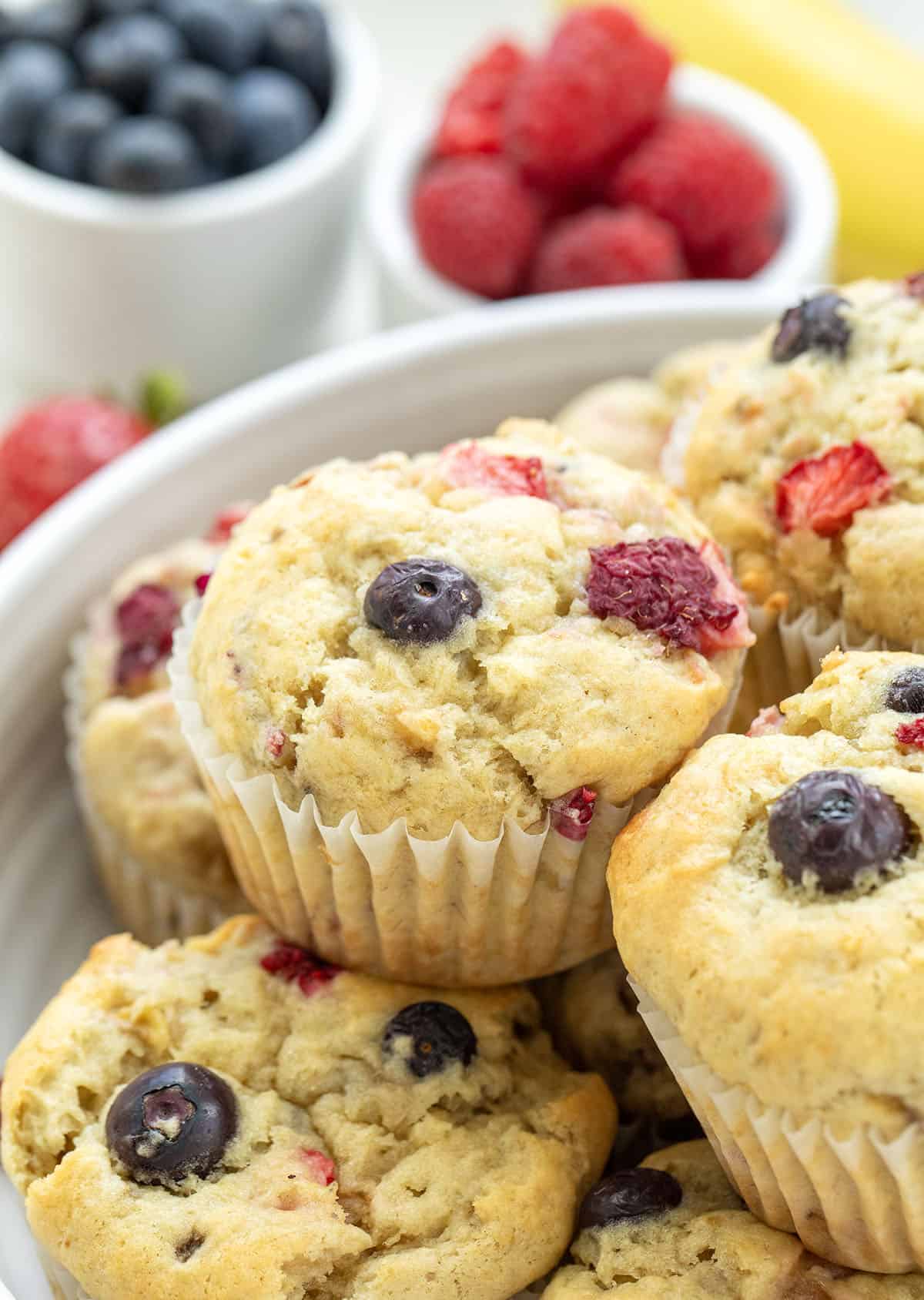 Close up of Triple Berry Banana Muffins in a bowl.
