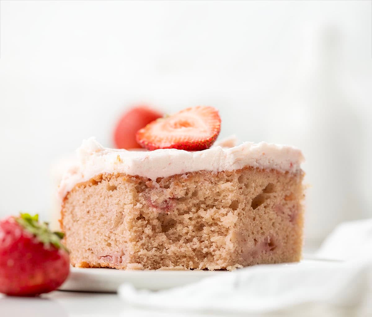 This Strawberry Sheet Cake with Cream Cheese Frosting is soft, fluffy, and packed with real strawberry flavor in every bite. The cake gets its flavor from a simple strawberry puree baked right in, then it’s finished with a creamy strawberry cream cheese frosting that makes it feel extra special without being fussy!