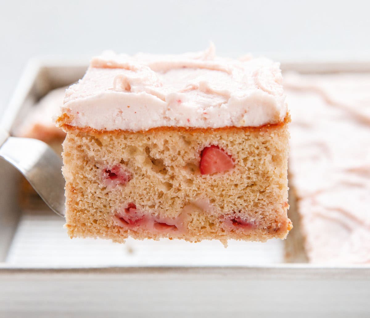 This Strawberry Sheet Cake with Cream Cheese Frosting is soft, fluffy, and packed with real strawberry flavor in every bite. The cake gets its flavor from a simple strawberry puree baked right in, then it’s finished with a creamy strawberry cream cheese frosting that makes it feel extra special without being fussy!