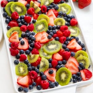Mixed Berry Lush in a white pan on a white table.