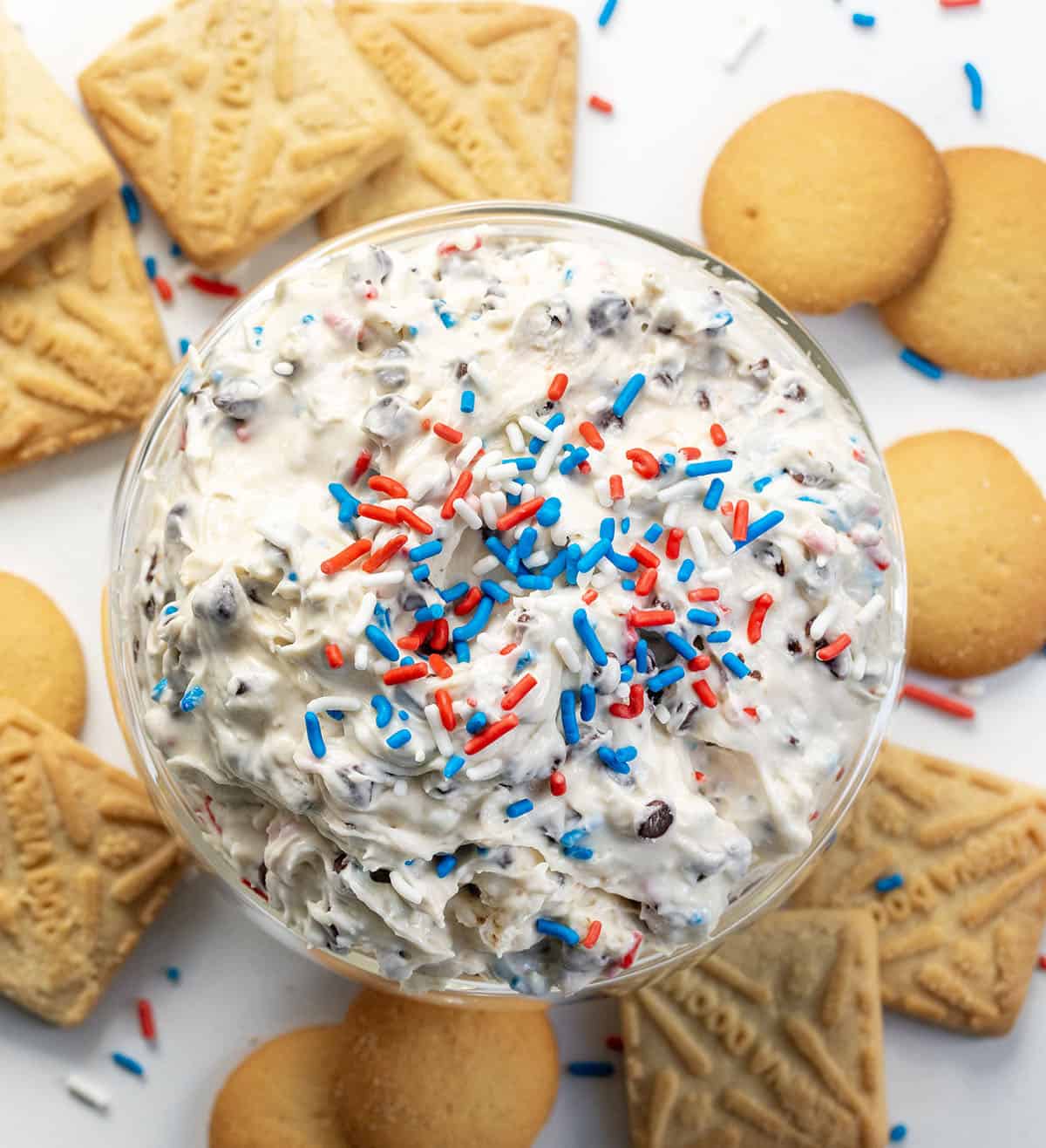 Looking down on a white table with patriotic booty dip on it.