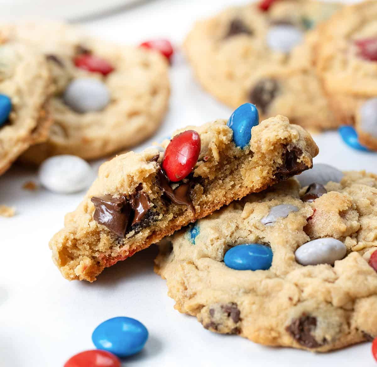 Close up of a halved Patriotic Monster Cookie showing tender inside.