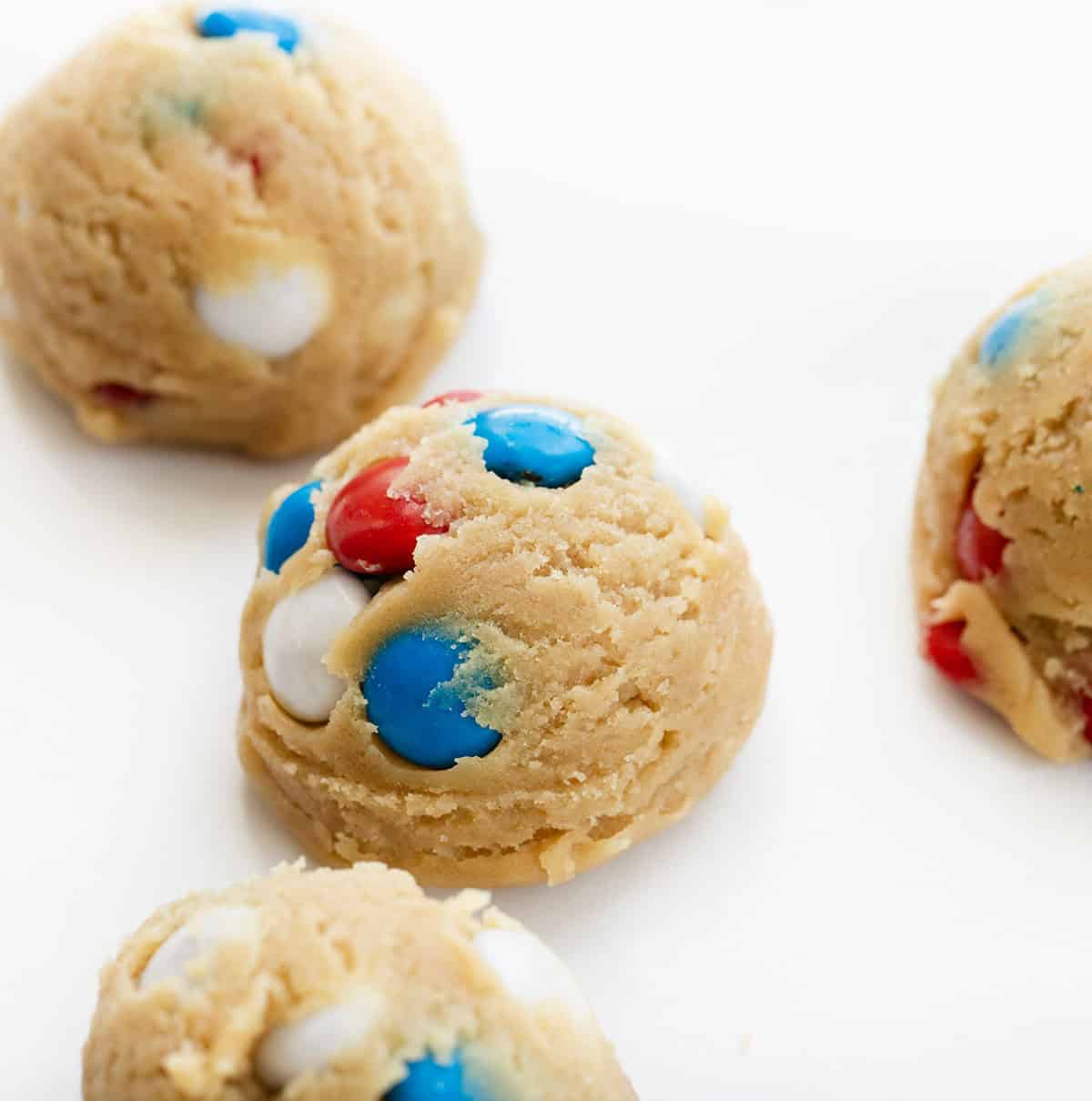 Raw Red, White, and Blue M&M Cookie batter before being baked.
