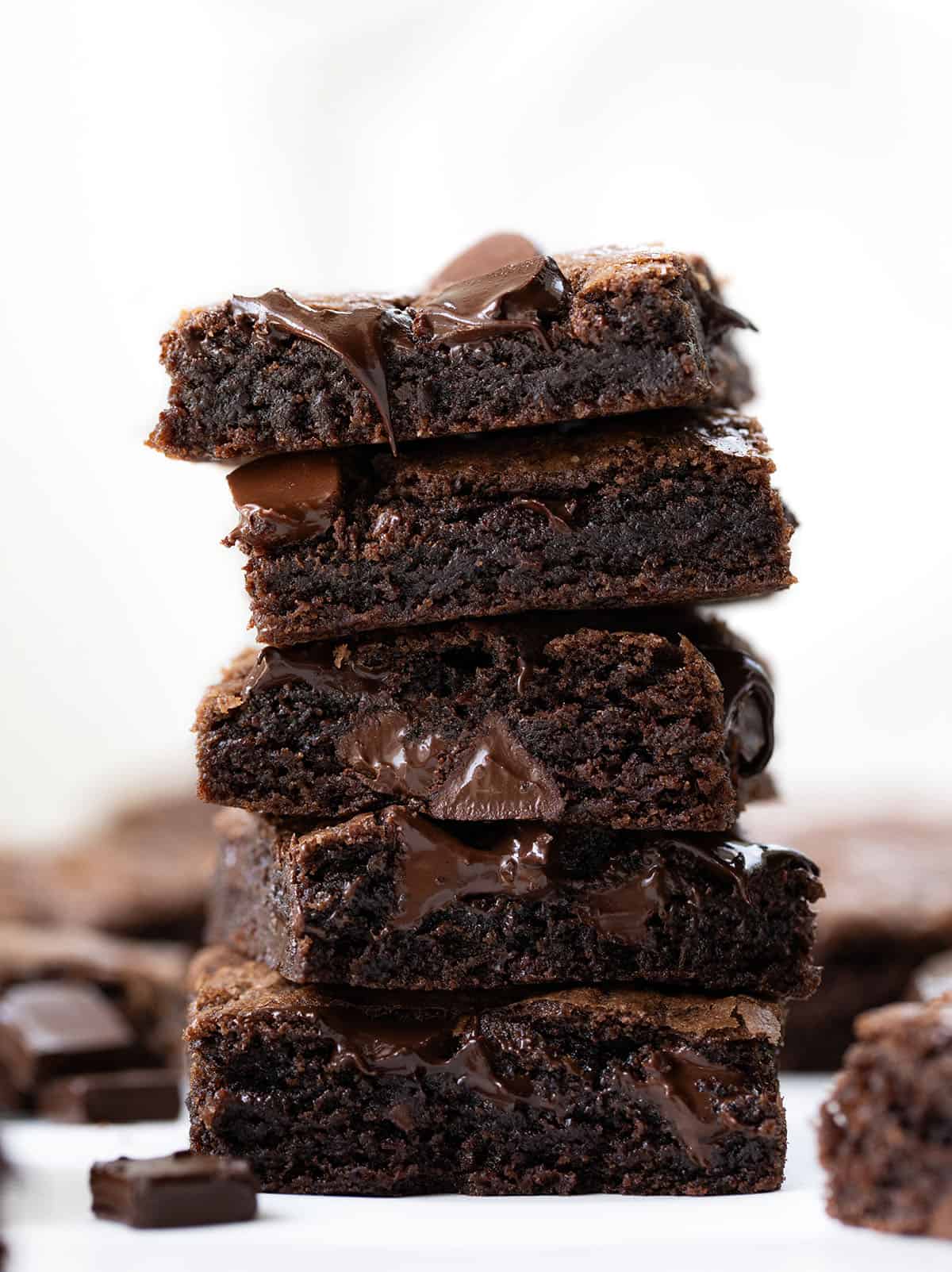 Stack of Double Chocolate Sheet Pan Cookies on a white table close up Stack of Double Chocolate Sheet Pan Cookies on a white table close up.