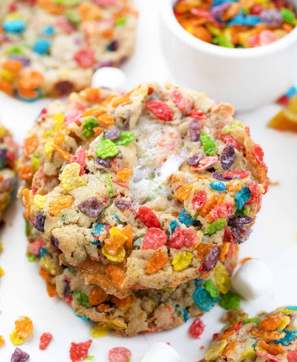 Close up of Fruity Pebbles Cookies on a white table.