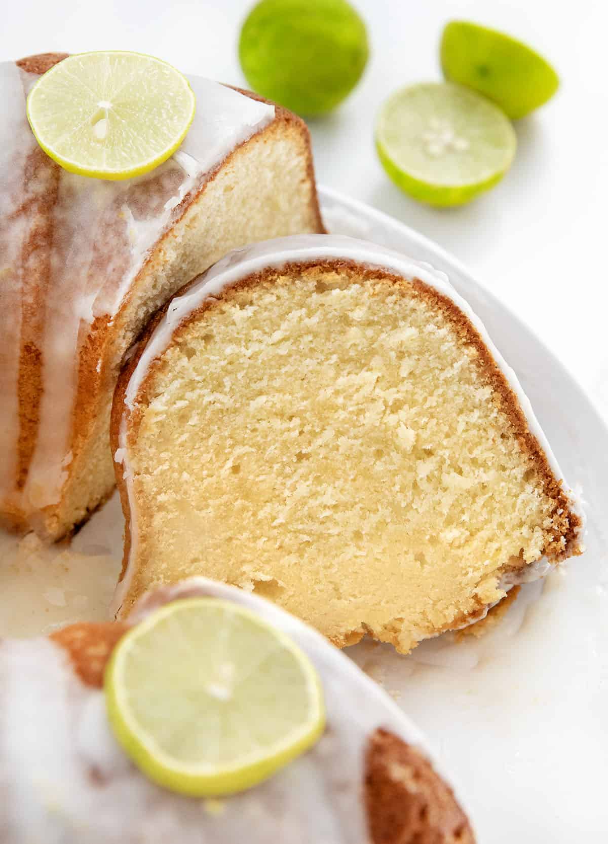 Cut into Key Lime Pound Cake with a piece laying on its side.