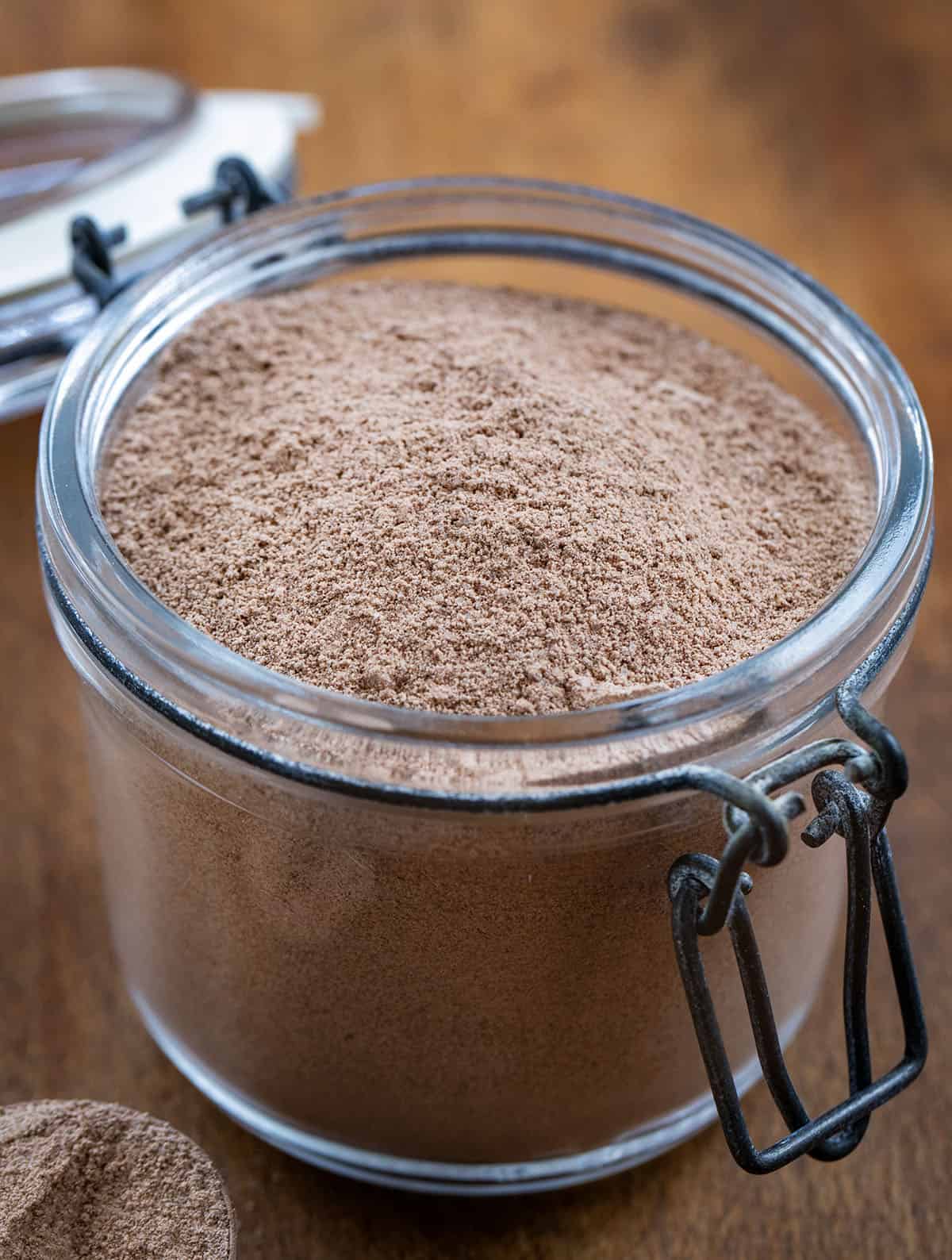 Jar full of Mocha Latte Mix on a wooden table Jar full of Mocha Latte Mix on a wooden table.