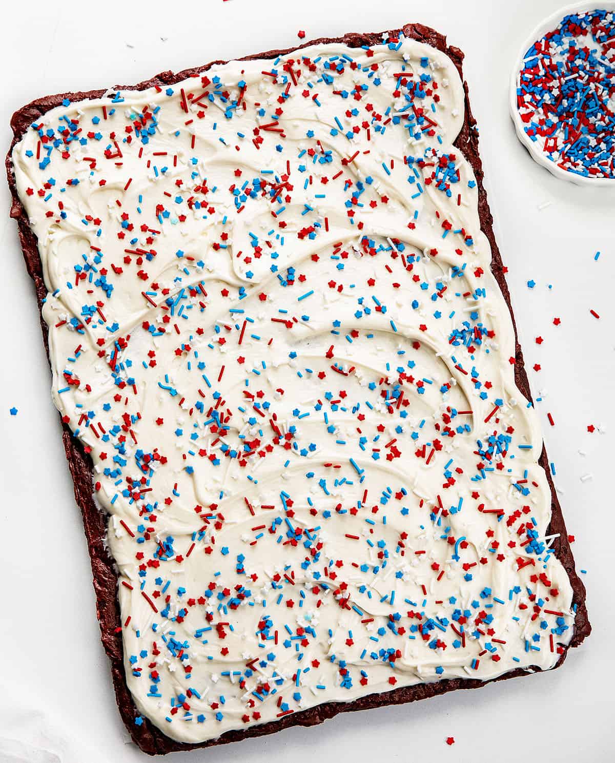 Patriotic Red Velvet Sheet Pan Brownies on a white table.