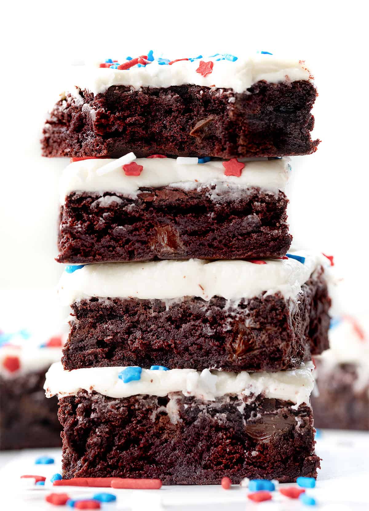 Close up of a stack of Patriotic Red Velvet Sheet Pan Brownies.